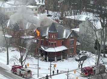Fire at Dufferin Avenue and Waterloo Street on February 23, 2023. Photo courtesy of Nancy Armstrong-Thomson via Twitter.