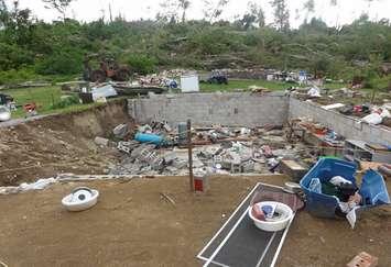 The remaining foundation of a destroyed home in Sainte-Anne-du-Lac observed after a tornado on June 18, 2017. Photo courtesy of www.mediarelations.uwo.ca 