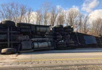 Tractor trailer flips on the Highway 401. December 11, 2019. (Photo courtesy of OPP/ via Twitter).