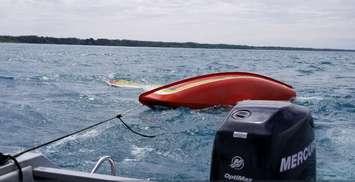Photo of a capsized sailboat courtesy of the OPP. 
