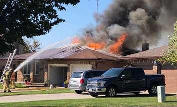 Firefighters battle a blaze at 30 Parkside Cres., September 30, 2019. Photo courtesy of the London Fire Department.