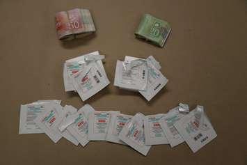 Cash and fentanyl patches. (Photo courtesy of St. Thomas Police Service). 