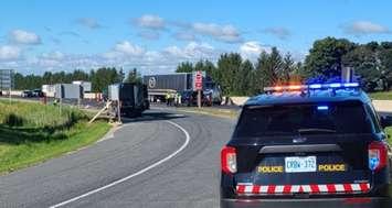 OPP investigating a fatal crash involving a cyclist on Highway 401 at Col. Talbot Rd., August 11, 2022. Photo courtesy of Middlesex OPP.