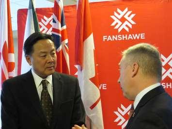 President and CEO of Siemens Industry Software Brian Mori speaks with Fanshawe College President Peter Devlin after the announcement of a new software grant for the college, January 25, 2017. (Photo by Miranda Chant, Blackburn News)