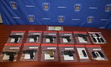 Guns and ammunition seized by police after the arrest of a wanted man, February 2, 2023. Photo courtesy of London police. 