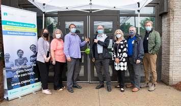 Officials cut the ribbon on the newly renovated Mental Health and Addictions Crisis Centre at 648 Huron St. Photo courtesy of CMHA Thames Valley Addiction and Mental Health Services.