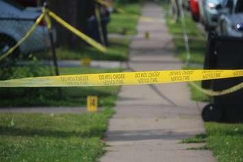 File photo of police tape on a residential street. July 29, 2019. (BlackburnNews.com file photo.)