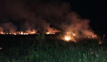 A large brush fire on Colonel Talbot Road, June 24, 2021. Photo courtesy of the London Fire Department. 