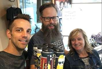 Dave Reed (centre) of the Forked River Brewing Company with Classic Rock 98.1 hosts Blair Henatyzen and Mindy Williamson. 