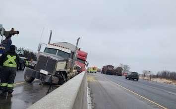 Two transport trucks collided into the centre median in the eastbound lanes of Highway 401 at Dorchester Road, January 14, 2022. Photo courtesy of West Region OPP.