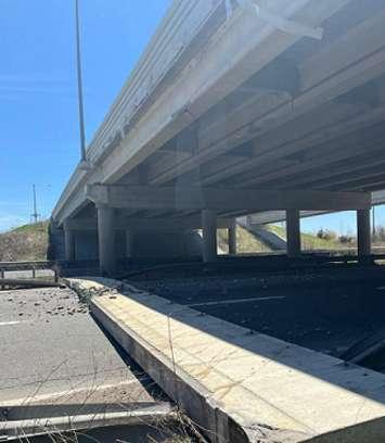 A slab of concrete from the Wayne Gretzky Parkway overpass lays across several lanes of Highway 403 in Brantford, May 9, 2022. Photo courtesy of Brantford police.