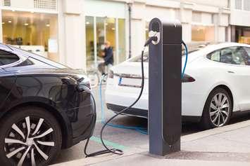 Photo of electric vehicle charging station courtesy of © Can Stock Photo Inc. / kasto