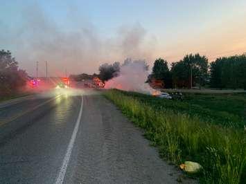 A vehicle catches fire shortly after hitting a hydro pole near St. Thomas. June 04, 2023. Photo supplied by OPP. 