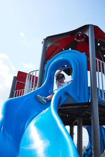Hunter Nethercott makes use of the newly opened Hully Gully playground at Southwest Optimist Park in London, August 29, 2021. (Photo courtesy of Abi Collins)