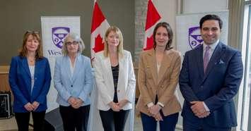 (From left) Prof. Lisa Saksida from Schulich School of Medicine & Dentistry; Donna Kotsopoulos, dean of education at Western; Prof. Emma Duerden of the Faculty of Education; Viviane Poupon, president and CEO of Brain Canada with North London Centre MP Peter Fragiskatos at the announcement of the grants at Western on May 24. (Christopher Kindratsky/Western Communications)
