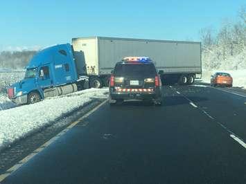 Transport in the ditch near Sexton Rd. on Hwy 402. Photo courtesy of OPP via twitter.