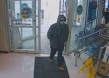 Police are looking for this suspect following a robbery a pharmacy in Woodstock, March 1, 2015. (Photo courtesy of the Woodstock Police Service)