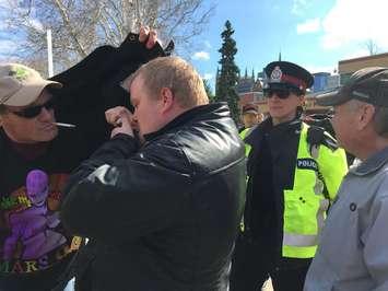 A man is arrested for smoking marijuana in London's Victoria Park during a 4/20 demonstration. Photo by Ashton Patis. 