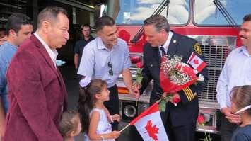 A group of Syrian refugees living in London gathered at Station No. 1 on June 30, 2016 to thank the London Fire Department for providing fire safety lessons. (Photo by Samuel Gallant)