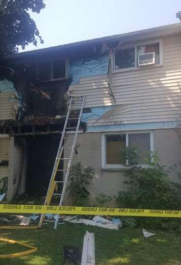 Fire damage to a unit at a townhouse complex on Limberlost Rd.  Photo courtesy of @BraveTube 