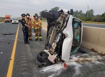 A vehicle rests on its side after a crash on Highway 401 east of Wonderland Rd., September 24, 2020. Photo courtesy of Middlesex OPP.