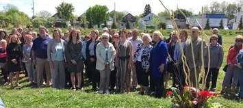 Minister Dr. Helena Jaczek, MP Deb Matthews and members of the St. Thomas community at the site of the new women's shelter on Princess Ave. May 21, 2015. 
