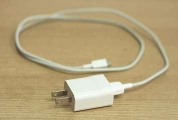 A cellphone charger. File photo courtesy of © Can Stock Photo / pimonpim.