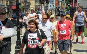 Participants in the Classic Rock 98.1 1K Marathon make their way down Richmond St., June 29, 2018. (Photo by Miranda Chant, Blackburn News)