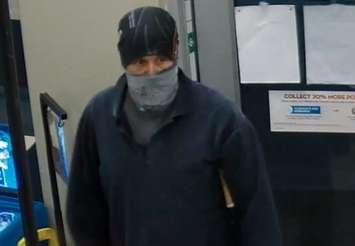 Police are looking for this suspect after a robbery at a Mac’s Milk in Woodstock, November 12, 2015. (Photo courtesy of the Woodstock Police Service)