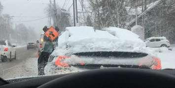 A vehicle pulled over for failing to clear snow from the rear window, December 1, 2020. Photo courtesy of London police. 