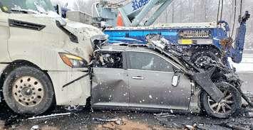 A transport truck and vehicle crashed on Highway 401 near Union Road during a snowstorm, April 18, 2022. Photo courtesy of the OPP. 