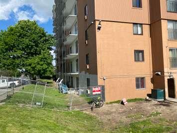 An apartment building on Baseline Road West, where a child fell from a window on June 9, 2022. Photo by Ruby Sweeney. 