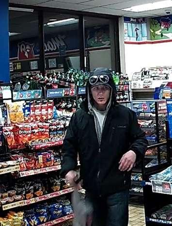 Surveillance camera screengrab of a suspect who St. Thomas police believed used a stolen credit card at a variety store on November 3, 2018. Photo provided by St. Thomas Police Service.