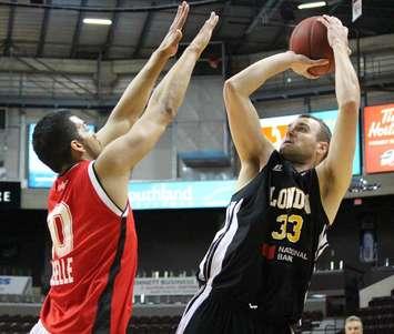 Windsor Express battle the London Lightning in game seven of the NBL semi-finals, April 1, 2014. (photo by Mike Vlasveld)
