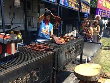 File photo of a Ribber cooking a rack of ribs. (Photo by Ricardo Veneza)
