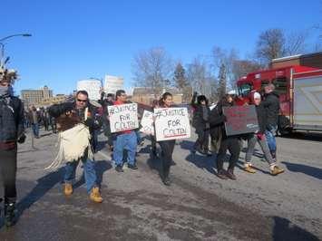 Dozens of supporters of Colten Boushie marched down Richmond St. in London, February 12, 2018. (Photo by Miranda Chant, Blackburn News)