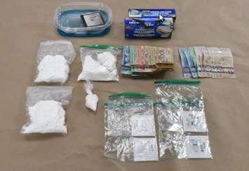 Cocaine, fentanyl, and cash seized by London police during a raid at an Osgoode Dr. home, September 21, 2018. Photo courtesy of London police.