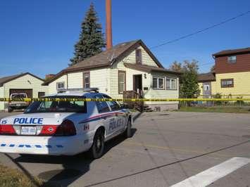 A home on Lansdowne Ave. is surrounded by police tape after a man was stabbed to death on Monday, October 2, 2017. (Photo by Miranda Chant, Blackburn News) 