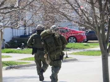 Officers patrolling the Madison Ave. area during standoff. April 28, 2015. Photo by Ashton Patis. 