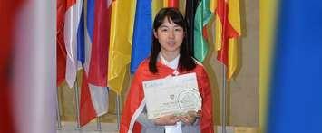 Huai-Ying (Ingrid) Huang  with her third place trophy at the International Brain Bee Competition in Berlin, Germany, July 9, 2018.  Photo courtesy of  the International Brain Bee. 