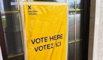 An Elections Ontario sign marks a polling station. (File photo by Blackburn Media)