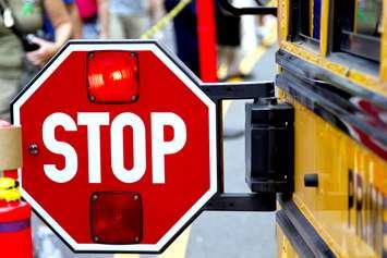 Stopped school bus. (Photo by © Can Stock Photo / Vonora). 