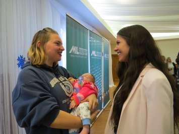 Emily Berryhill and her three-month-old daughter Octavia visit with public health nurse Becki Bohdanowicz at the Middlesex London Health Unit, December 1, 2017. (Photo by Miranda Chant, Blackburn News) 
