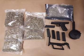 Drugs, a gun, and ammunition seized by London police in a raid on Wonderland Rd. S, June 7, 2018. Photo courtesy of London police.