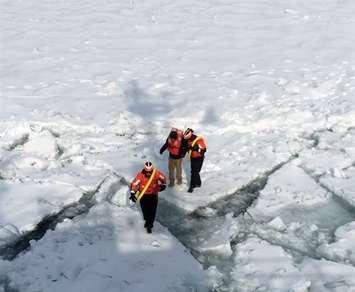 The coast guard rescues a man attempting to walk across Lake St. Clair on March 5, 2015. (Photo courtesy U.S. Coast Guard/Lt. Josh Zike)