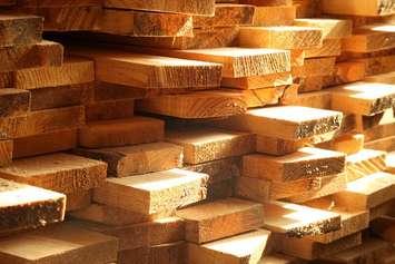 Lumber stacked in a pile. File photo courtesy of  © Can Stock Photo/Safak_Cakir