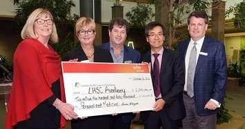 LHSC Auxiliary President Louise McKnight (Left) presents a cheque for $2.24 million, supporting the personalized Medicine Program at London Health Sciences Centre, to LHSC Chief Clinical Officer Laurie Gould, LHSF Chair Tod Warner, LHSC Chair Chief Clinical Pharmacology Dr. Richard Kim and LHSF President & CEO John MacFarlane at Victoria Hospital in London, October 6, 2016. Photo courtesy of the London Health Sciences Foundation.