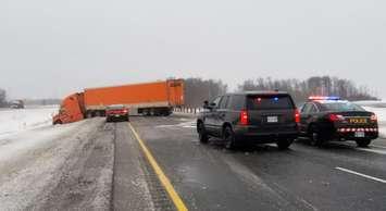 A jack-knifed tractor trailer blocks the westbound 402 near Strathroy.  File photo courtesy of the OPP. 