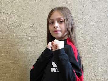 Athena Papadatos, 9, will compete at the World Karate Commission World Championships in Dublin, Ireland this October. (Photo by Miranda Chant, Blackburn News)