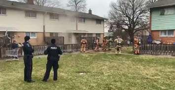 Firefighters work to extinguish a fire at a townhouse on Barberry Court, January 14, 2020. Photo courtesy of the London Fire Department.